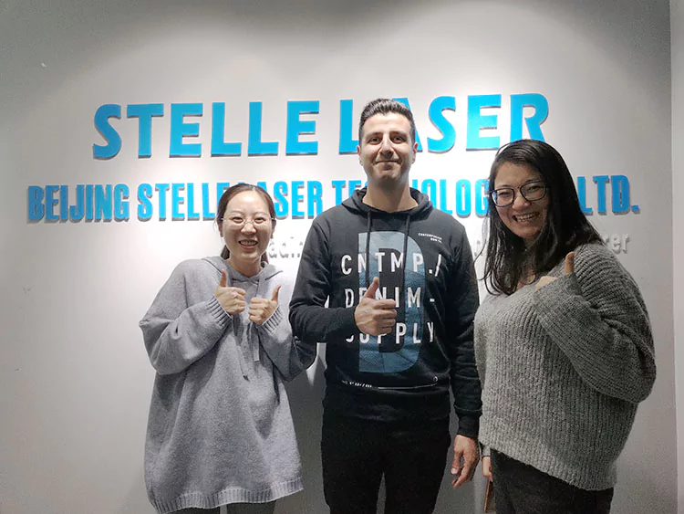 Me and client in our company stelle laser